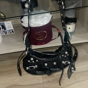 Balenciaga
Le Cagole XS Shoulder Bag With Rhinestones